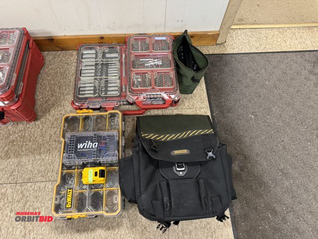Lot 1-4585 - Lot of (2) Milwaukee Packout sets, both with assorted sockets and bits, and (1) DeWalt Packout unit ...