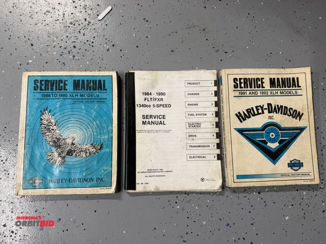 Lot 1-8299 - Lot of (3) Harley Davidson Service Manuals, includes 1991 and 1992 XLH Models, 1984-1990 FLT/FXR, 13...