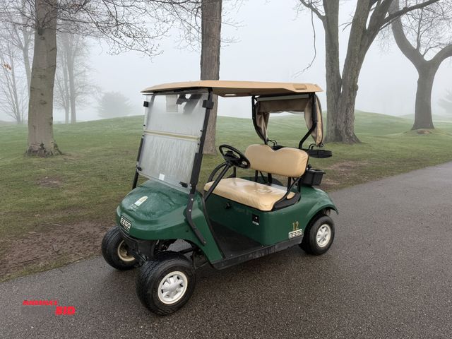 Lot 1-19335 - (1) 2015 E-Z-Go golf cart with a Kawasaki gas engine, includes canopy, ball cover, club cover, fold-...