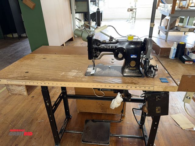Lot 1-4686 - (1) Singer, model 107W1, commercial sewing machine, mounted on Singer power table, 1/2 HP, 3 phase m...
