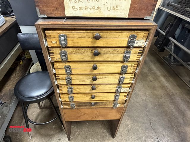 Lot 1-12447 - (1) 20" width x 48" height x 16" depth wood stand with (7) assorted pin gauge sets with slide out wo...