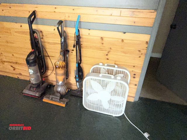 Lot 1-13193 - Lot of 3 vacuums, includes (1) Dyson Ball, (1) Dirt Devil, (1) Eureka, and (2) Lasco 20" box fans.
