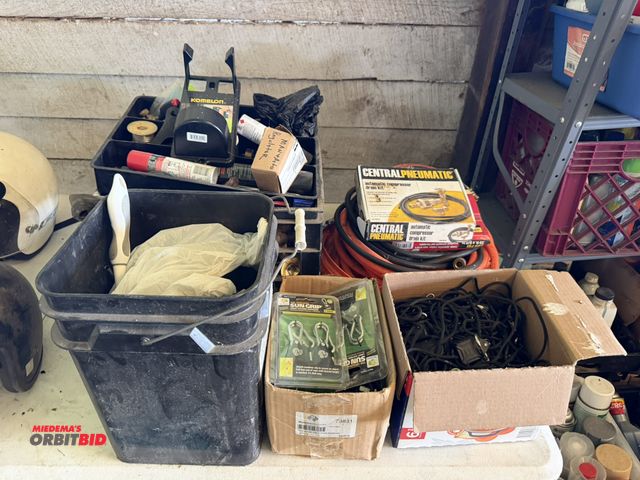 Lot 1-8508 - Lot of assorted items, includes Sun Grip light fixture hangers, rubber air hose, automatic compresso...