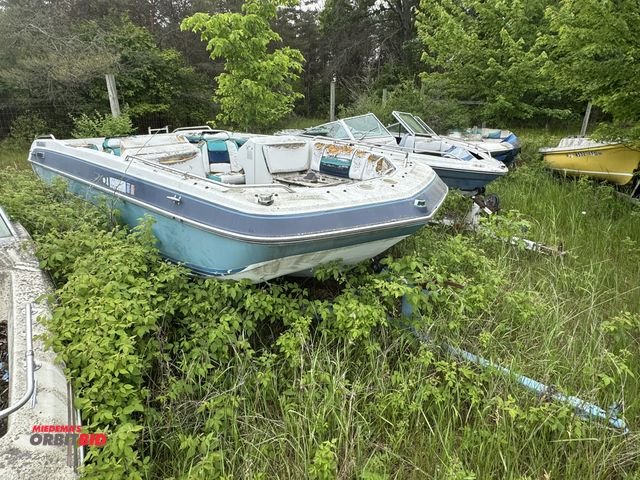 Lot 1-6576 - (1) Four Winns, model Freedom 180, 18' Candia deck boat, severe weather damage, partial motor, #4WNM...