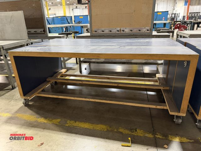 Lot 1-5241 - Set of (3) matching 8' length x 36" height x 18" depth rolling wood tables.