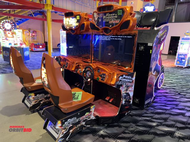 Lot 1-11212 - (1) Raw Thrills Super Cars Fast and Furious single racing arcade game, S/N SCARS42-42167, Makvision ...