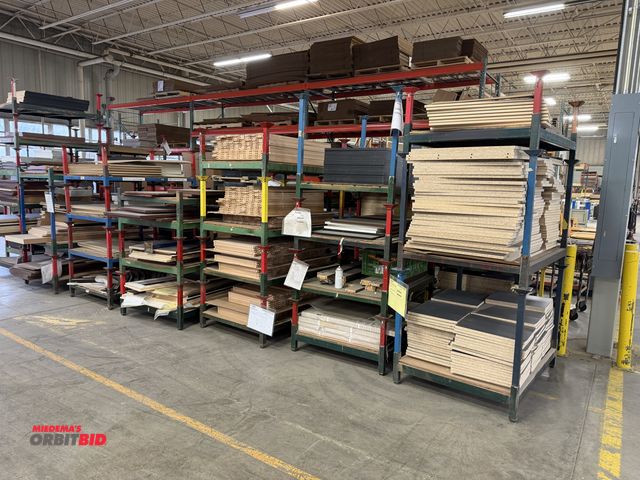 Lot 1-17363 - Approx. (55) 48" length x 9" height x 35.5" depth stackable steel racks full of assorted wood compos...