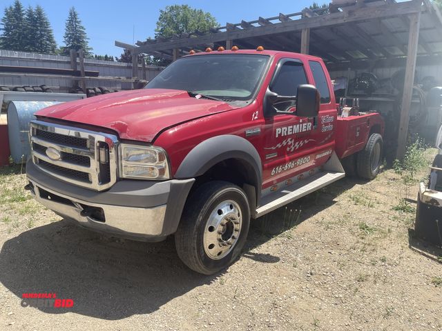 Lot 1-12068 - 2005 Ford F-550 XL Super Duty (1) extended cab tow truck, in running condition, with a V8 Turbo dies...