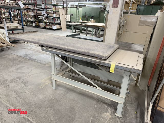 Lot 1-16406 - (1) tilting table, 60" x 30" with 77" x 30" carpeted wood tilting table top, and (1) rolling product...