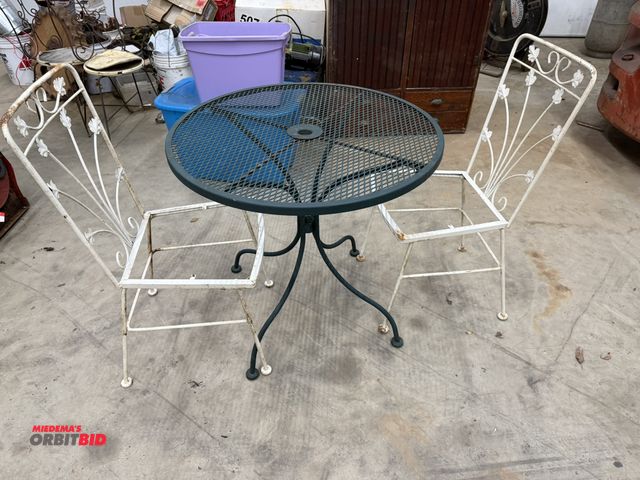 Lot 1-1486 - (1) 30.5" diameter x 28.5" height steel café table, with (2) metal framed chairs (need seats replace...