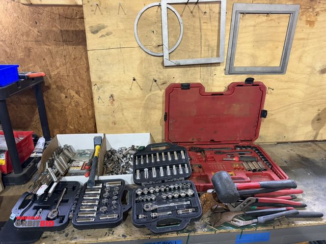 Lot 1-18697 - Lot of assorted tools, including various sockets, (1) rubber mallet, multi-purpose framing screws, (...