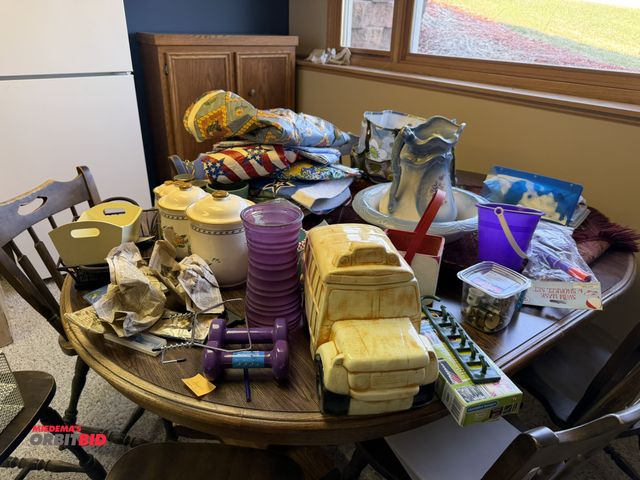 Lot 1-19211 - Contents on table, includes school bus cookie jar, weights, flour and sugar sets, baskets, tea sets,...