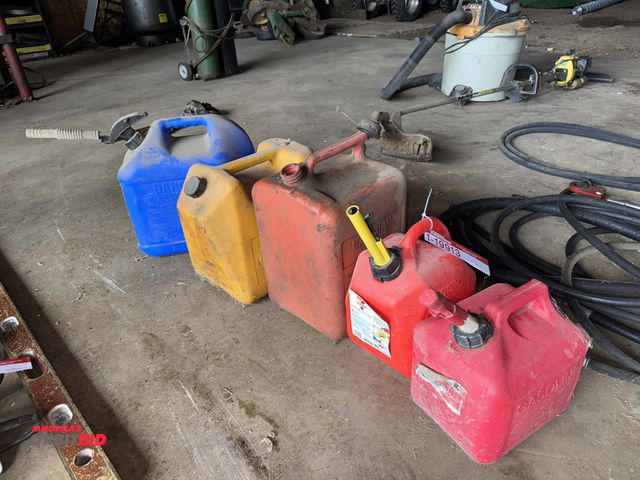 Lot 1-19913 - Lot of (2) 2.5 gallon gas cans, (2) 5 gallon gas cans (1 is missing cover/both are missing spouts), ...