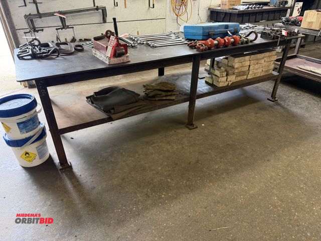 Lot 1-6443 - (1) approx. 10' length x 34" height x 36" depth heavy duty steel table with 1/4" thick steel top, co...