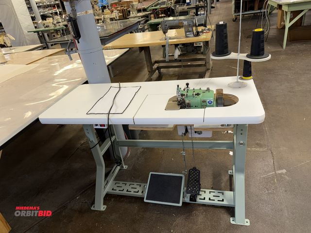 Lot 1-4734 - (1) Merrow MG-3DW-2 sewing machine with power table, 47.5" x 20" deep x 29.5" tall, 3 phase, S/N 309...