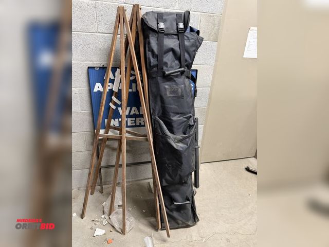 Lot 1-17277 - (1) soft side case with assorted trade show stand equipment, and (3) approx. 5' tall wood easels.