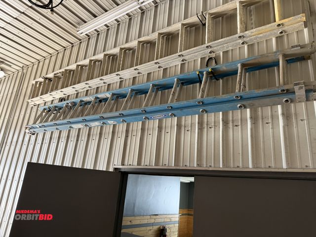 Lot 1-13199 - (1) Werner 24' fiberglass extension ladder, winning bidder responsible for proper removal.