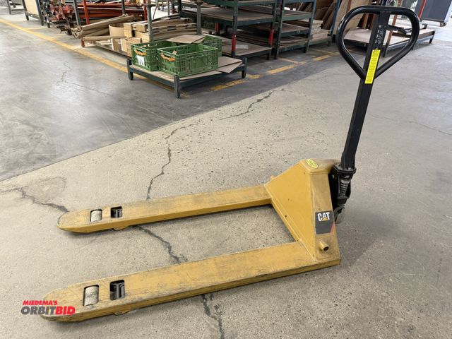 Lot 1-16304 - (1) Caterpillar 55 lb. capacity hydraulic pallet jack, in working condition.