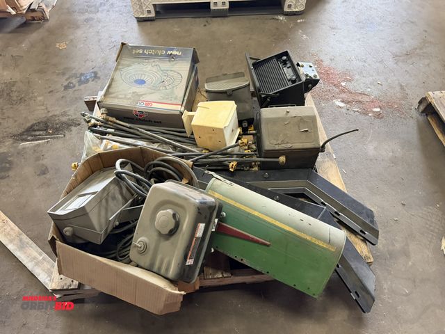 Lot 1-18027 - (1) skid lot with assorted items, includes (3) tractor console radios, spray drops, Dickey John DJPM...