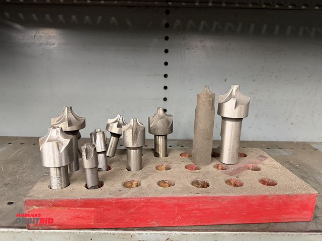 Lot 1-1822 - Lot of (11) various corner rounding end mills with a wood block.