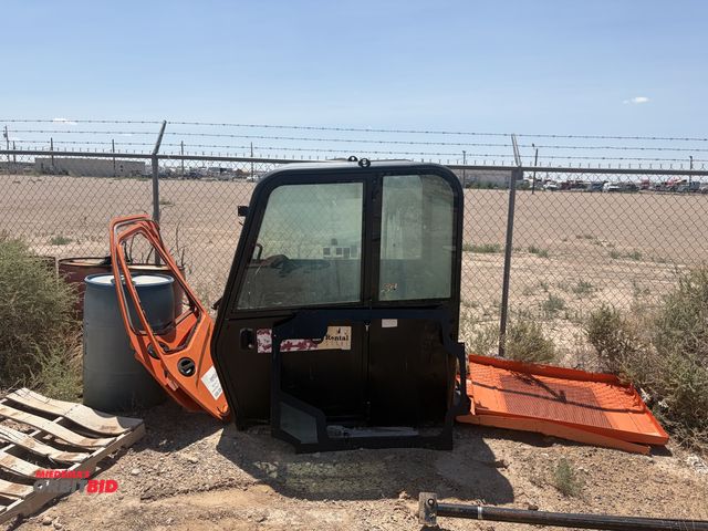 Lot 1-18302 - (1) Skytrak cab, cab enclosure only, includes (2) doors and side panels,