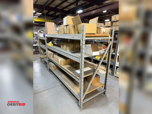 Lot 1-18910 - (2) shelving units (includes 2 heavy duty steel racks), filled with assorted clock parts, includes p...