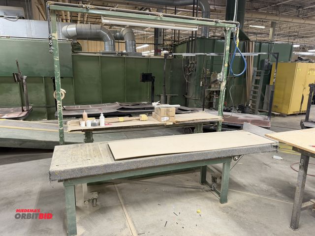 Lot 1-16410 - (1) steel frame tilting table with aluminum and carpeted top, 8' length x 24" width, (1) rolling wor...