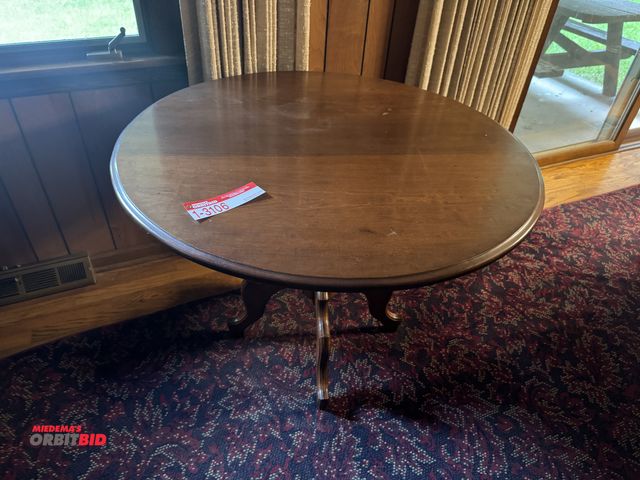 Lot 1-3106 - (1) Wooden round table, approx. 39"
