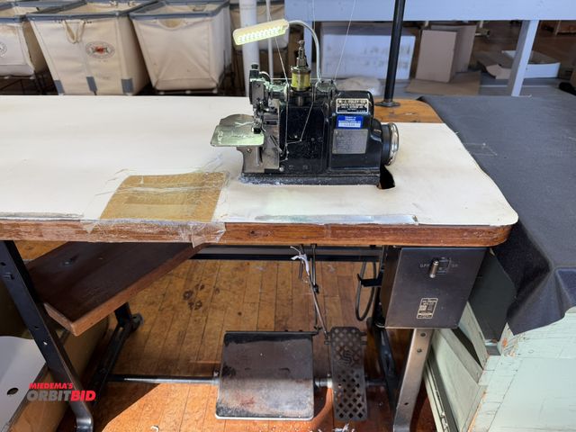 Lot 1-4693 - (1) Merrow industrial sewing machine, Style A3DW, S/N 109067, on Singer power table, 1/2 HP, 3 phase...