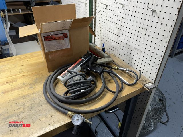 Lot 1-18861 - (1) PG air powered caulk gun, foot pedal control, includes manual caulk gun, and assorted tubes of s...