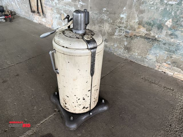 Lot 1-1124 - (1) vintage Alemite rolling grease container with regulator and manual pump.