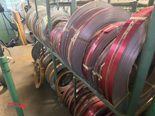 Lot 1-18784 - (1) 70" length x 64" height x 15" depth steel tube, 3-tier rack full of anodized aluminum rolls, col...