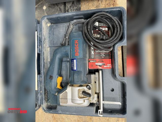 Lot 1-16591 - (1) Bosch, model 1587AVS, corded jigsaw with blades, accessories, and manual.