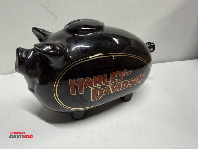 Lot 1-8317 - (1) approx. 6" long x 3.5" tall, collectible, porcelain Harley Davidson hog bank, dated 1982.