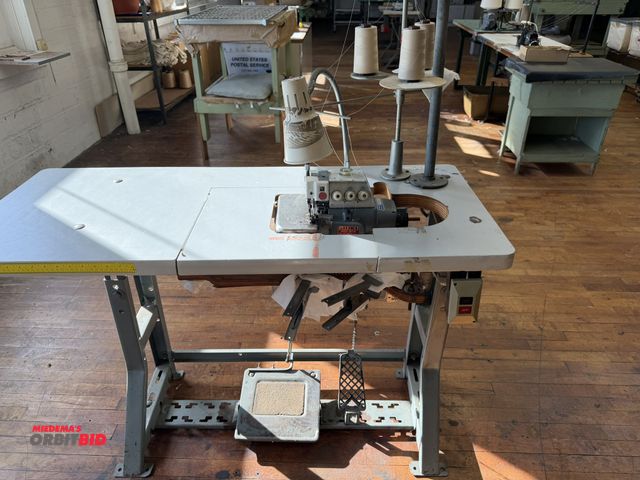 Lot 1-4692 - (1) Juki, model MO-816, Class DD6, commercial sewing machine mounted on power table, Mitsubishi 1/2 ...