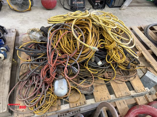 Lot 1-1402 - (1) skid of assorted indoor and outdoor extension cords, various sizes, lengths and styles, some wit...