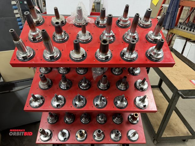 Lot 1-1941 - Lot of (54) Cat 50 shrink fit tool holders (rack not included).