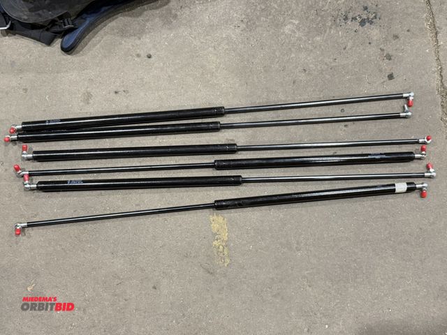 Lot 1-18533 - Lot of (6) new pneumatic shocks for hoods, tailgates, etc.