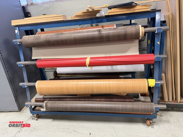 Lot 1-17330 - (2) 71.5" wide x 56.5" tall x 24" deep steel laminate dispensing racks full of assorted colored lami...