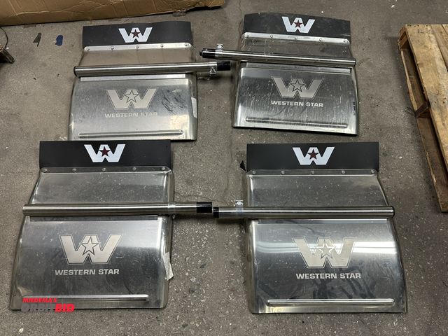 Lot 1-14899 - (2) sets of Western Star chrome quarter fenders.