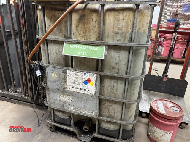 Lot 1-2080 - (1) approx. 330 gallon capacity poly waste oil container with cage, contents is unknown, unit contai...