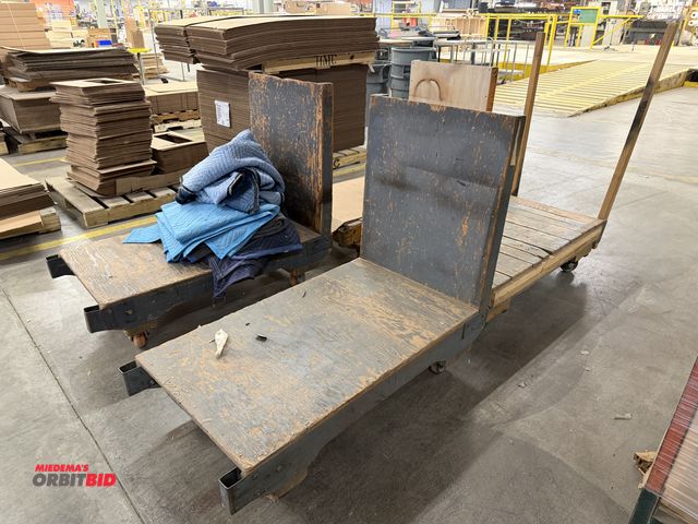 Lot 1-17389 - Lot of (4) 48" length x approx. 13" height x 27" depth wood flat carts, and approx. (4) various movi...