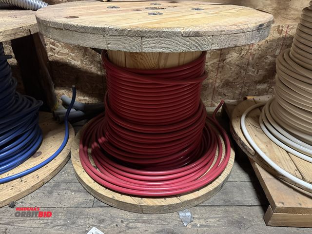 Lot 1-4293 - (1) partial spool of Priority Wire 300 KCMIL, THHN #2 aluminum wire, 33.5" diameter x 28" tall, red.