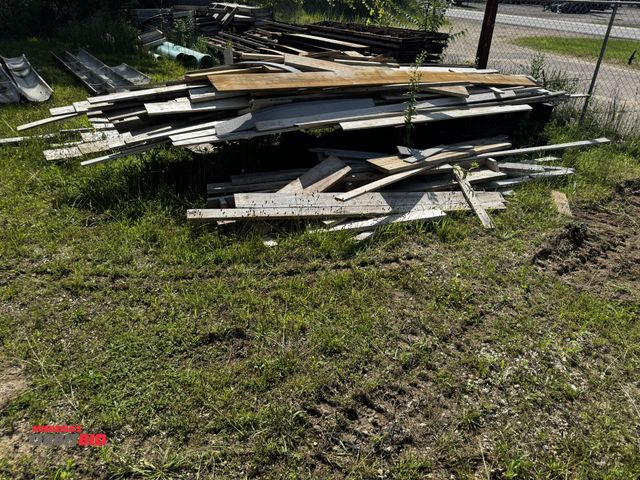 Lot 1-14272 - Large lot of assorted lumber, includes ground contact wolmanized boards, 1 x 6, 2 x 4, 1 x 4, and mu...