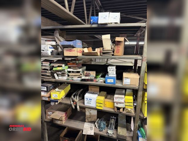 Lot 1-18605 - Contents of shelf and floor, includes assorted bearing seals, Stemco hub cap, model 340-4066, hydrau...