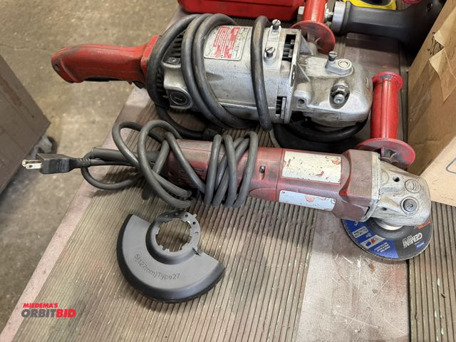 Lot 1-6447 - Lot including (1) Milwaukee (Cat # unknown) 5" angle grinder, and (1) Milwaukee, Cat #6096, heavy du...