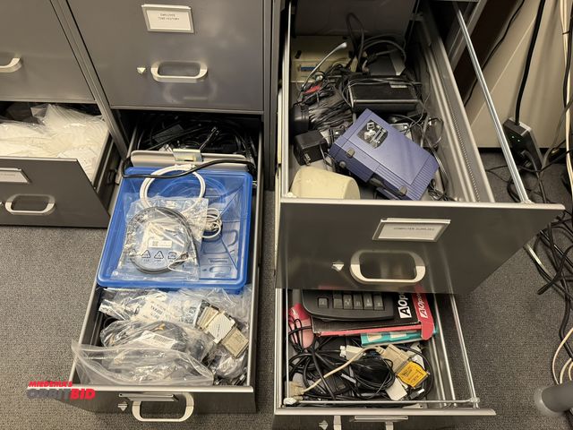 Lot 1-15528 - (3) drawers of assorted computer parts, includes plugs, keyboards, mouse, routers, HDMI plugs, PC pl...