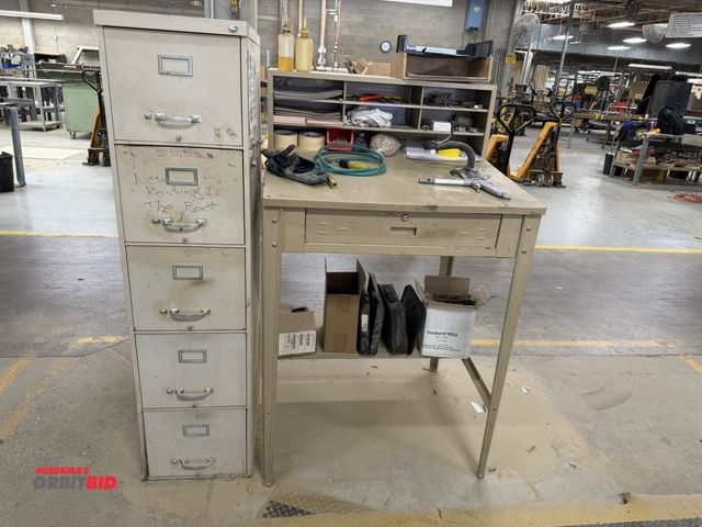 Lot 1-16168 - (1) 34" width x 45" height x 30" depth steel foreman's desk with single drawer and 11" tall top moun...