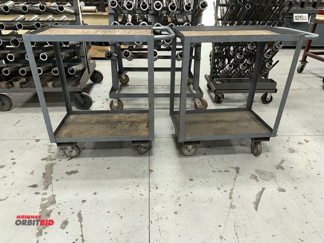 Lot 1-19220 - Lot of (2) 30" length x 38" height x 18" depth 2-tier steel shop carts.