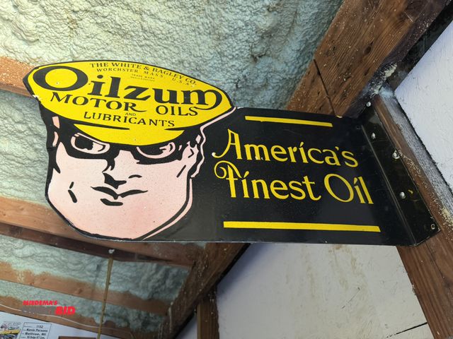 Lot 1-8231 - (1) collectible reproduction, approx. 26" long x 19" tall, Oilzum tin sign (2-sided).